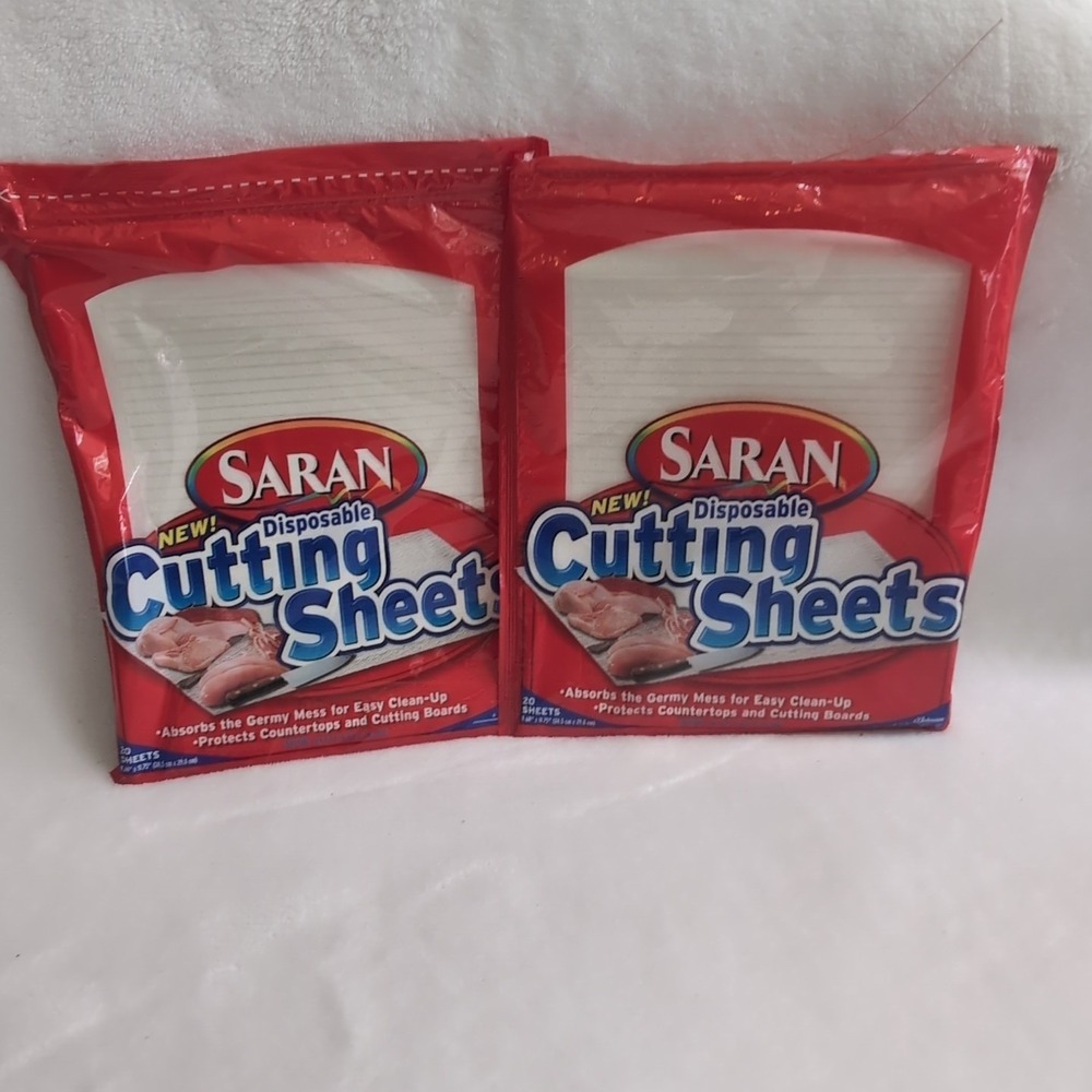 2 Pack 32 Saran Disposable Cutting Sheets New/Opened Packages Discontinued Set